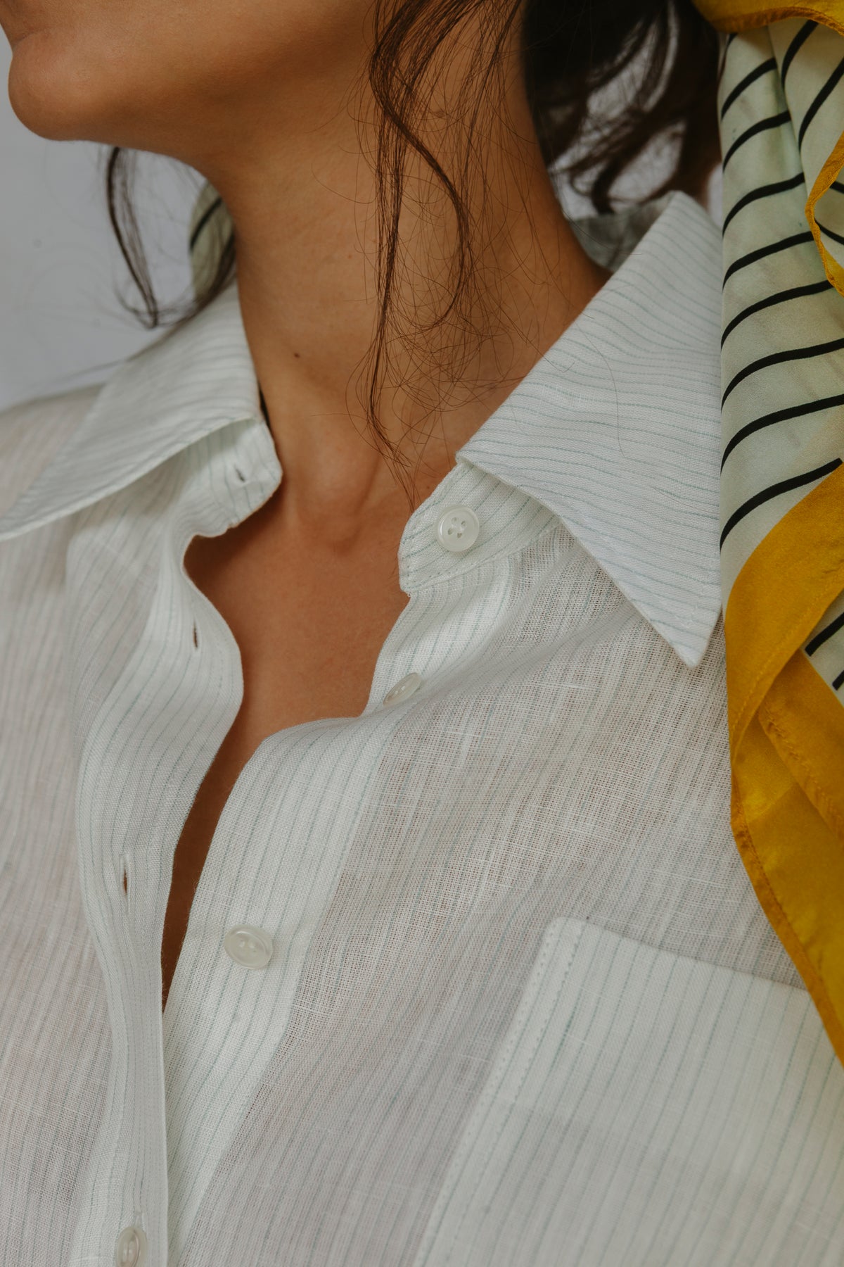 close up Oversized white and blue-green striped linen shirt with wide-leg trousers by MARAH